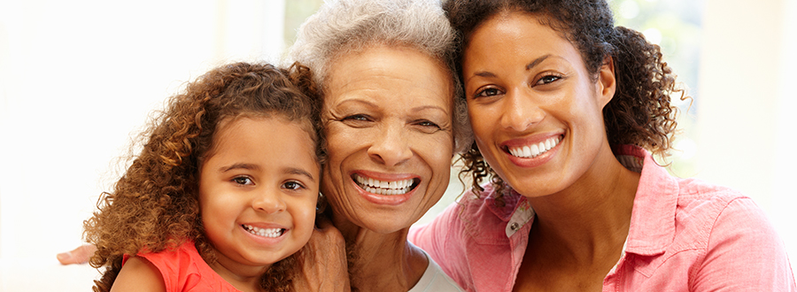 Resident at American House West Bloomfield senior community with loved ones